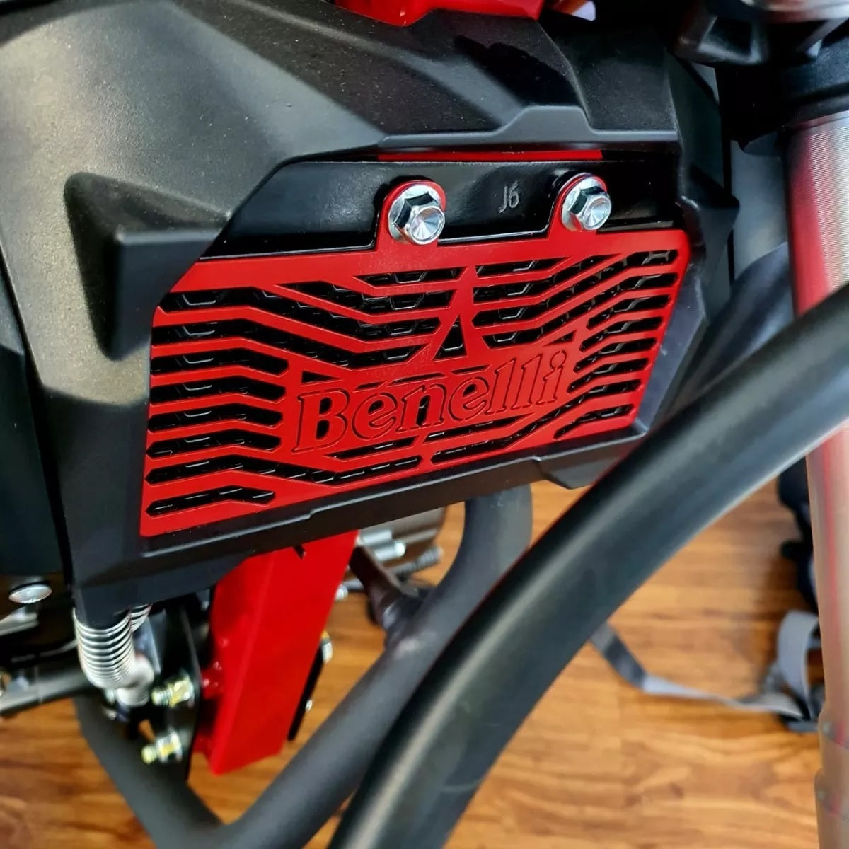 Protector Radiador TNT 135